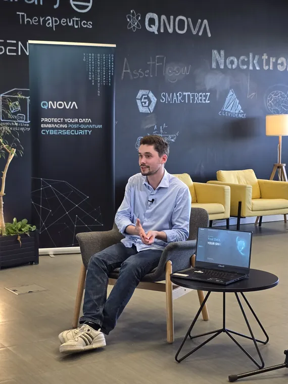 A team member speaking during a filmed interview at the office
